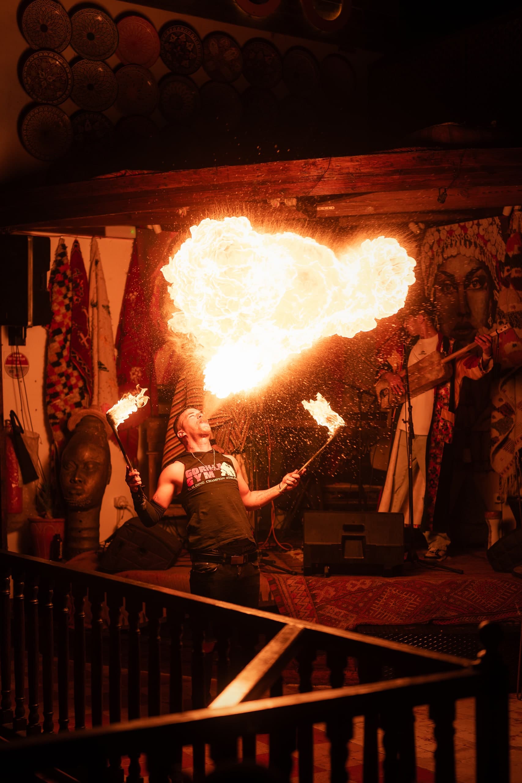 A street performer breathing fire in Morocco.