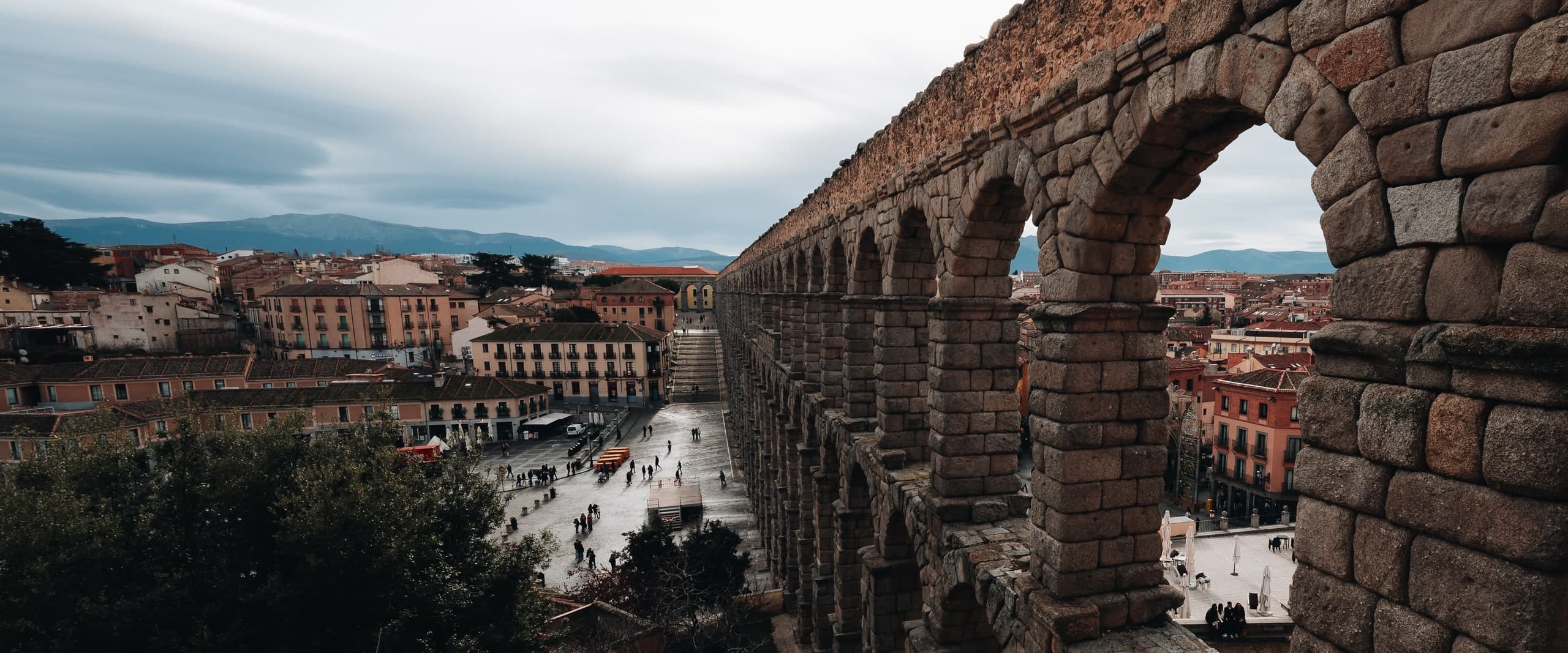 The Roman aqueduct of Segovia, Spain, stretching through the old town.